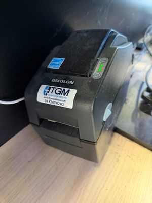 a small printer that is sitting on a counter