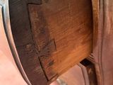 a close up of a piece of wood on a bench