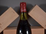 a bottle of wine that is sitting on a table