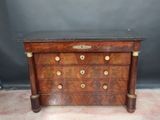 an antique chest of drawers with marble top