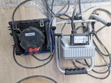 wires and wires connected to an electrical device on the floor