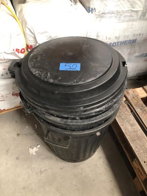 a black trash can with a blue sticker on it