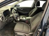 the interior of a car with a steering wheel, dashboard, and dashboard controls