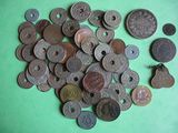 a lot of coins that are on the table