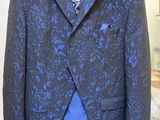 blue and black jacket and tie on a mannequin mannequin mannequin mannequin mannequin mannequin mannequin mannequin