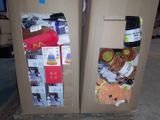 two cardboard boxes that have stuffed animals in them