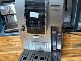 a coffee machine that is sitting on a wooden table