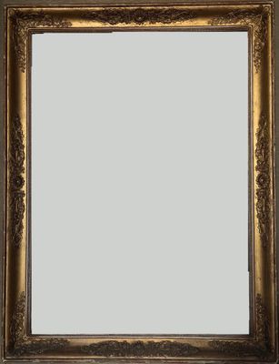 a gold ornate frame with a white background