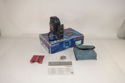 a box with a camera and other items on the table