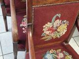 many chairs that are lined up on the floor