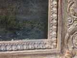 a close up of a mirror on a wall in a room