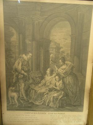 an old picture of a woman and a man sitting in a room
