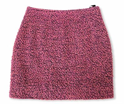 a pink knitted skirt with a zipper at the bottom