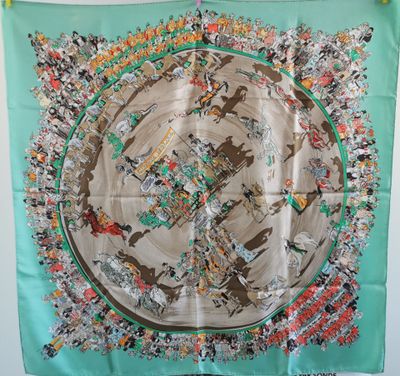 un gros plan d'un foulard carré accroché à un mur