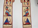 pair of ancient egyptian wall hangings with images of men and women