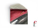 a picture of a purse that is open on a white background