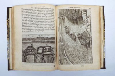 an open book with a drawing of a man on a boat in the water