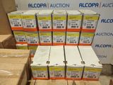 boxes of alcopa are stacked on top of each other in front of a sign