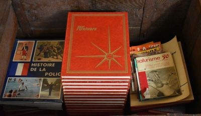 many books that are sitting in a box
