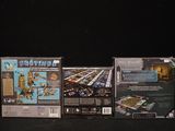 three games in the box on the black table