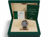 Montre Rolex Submariner Date en acier avec cadran noir, dans son coffret