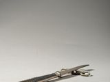 a knife that is laying on a table