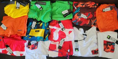 a pile of clothing that is on a table