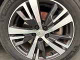 a close up view of a tire on a car