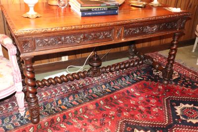 a wooden table with a book on top of it