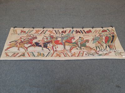 une image représentant une tapisserie sur laquelle figurent des personnages à cheval