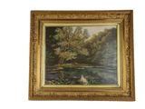 une image représentant un tableau représentant un lac et des arbres, dans un cadre doré