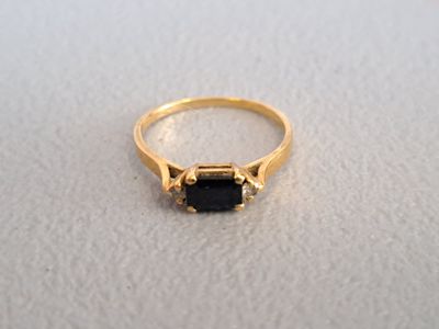 Petite bague en or jaune 18K 750 millièmes sertie d'une pier… - Photo 1