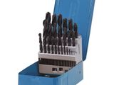 an assortment of drill bits in a blue case on a white background