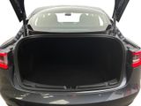 the back of a black car with its trunk open and the back of it ' s trunk open