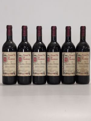 six bottles of wine are lined up in a row