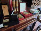 a wooden cabinet with a clock on top of it