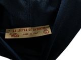 a close up of a label on a suit jacket