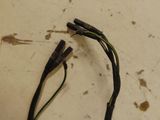 a close up of a pair of wires on a table