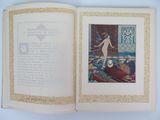 an open book with a picture of a woman on it