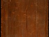an old wooden door with a black background and a brown door handle