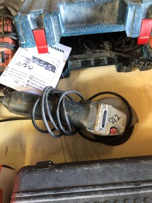 a close up of a car ' s engine with wires attached to it