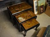 three small tables that are sitting on the floor