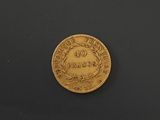 a gold coin with the number 40 on it