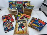 a lot of comic books that are on the table