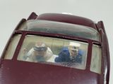 a toy car with two people inside of it