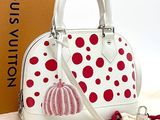 louis vuitton handbag with red and white polka dots on it