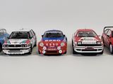 five small cars that are lined up in a row