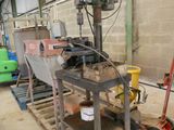 a machine that is sitting on a pallet in a warehouse