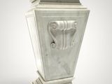 a white vase with a design on it on a gray background