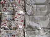 a lot of shirts that are sitting in a box